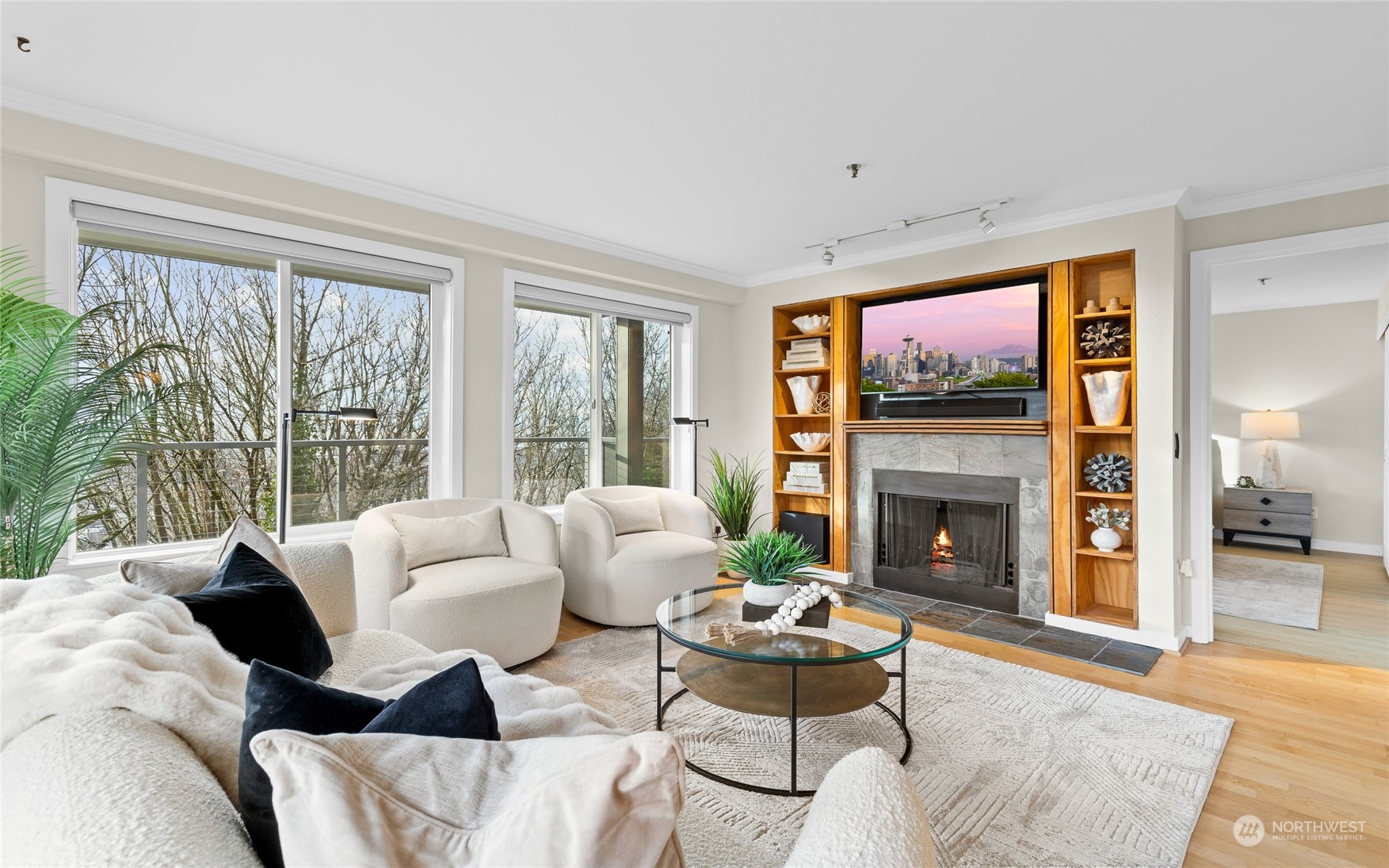 a living room with furniture and a fireplace