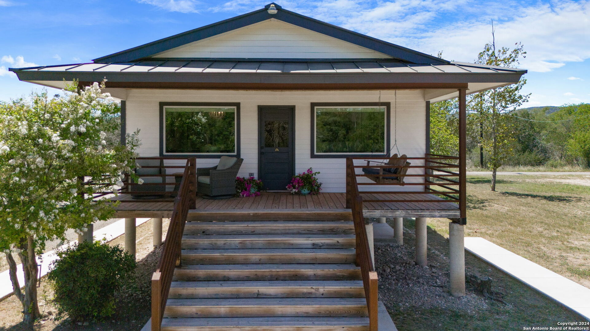 a front view of a house with a porch