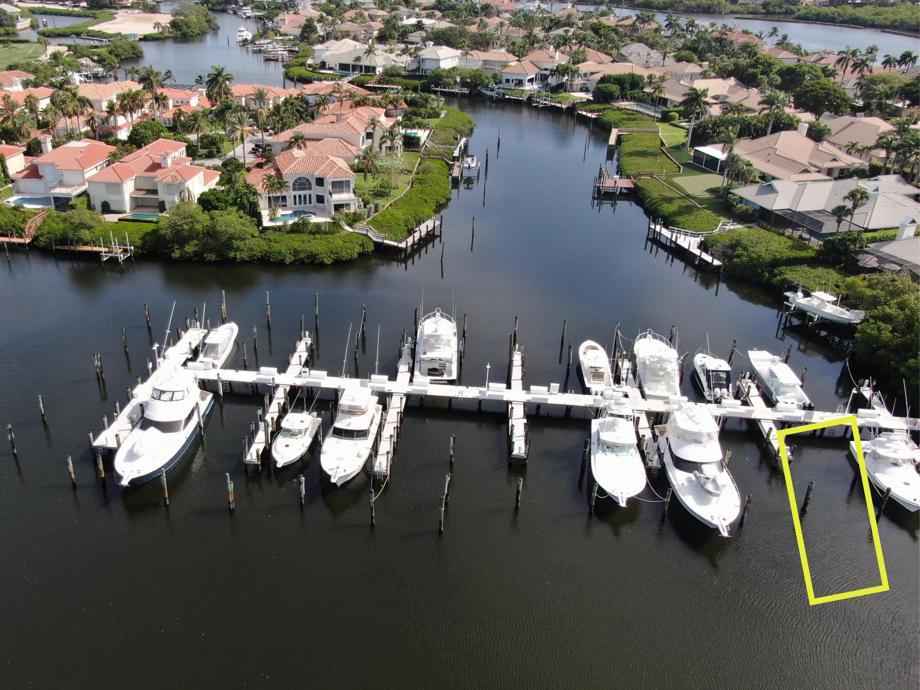 an aerial view of a house with lake view