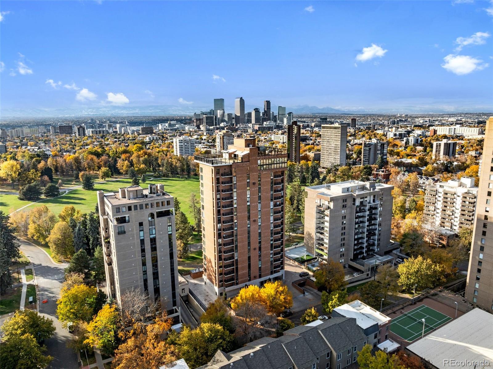 a view of a city with tall buildings