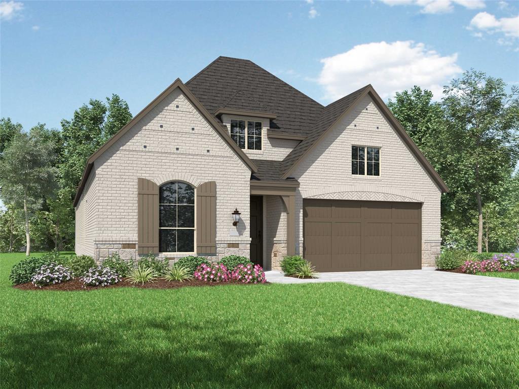 a front view of house with a yard and garage