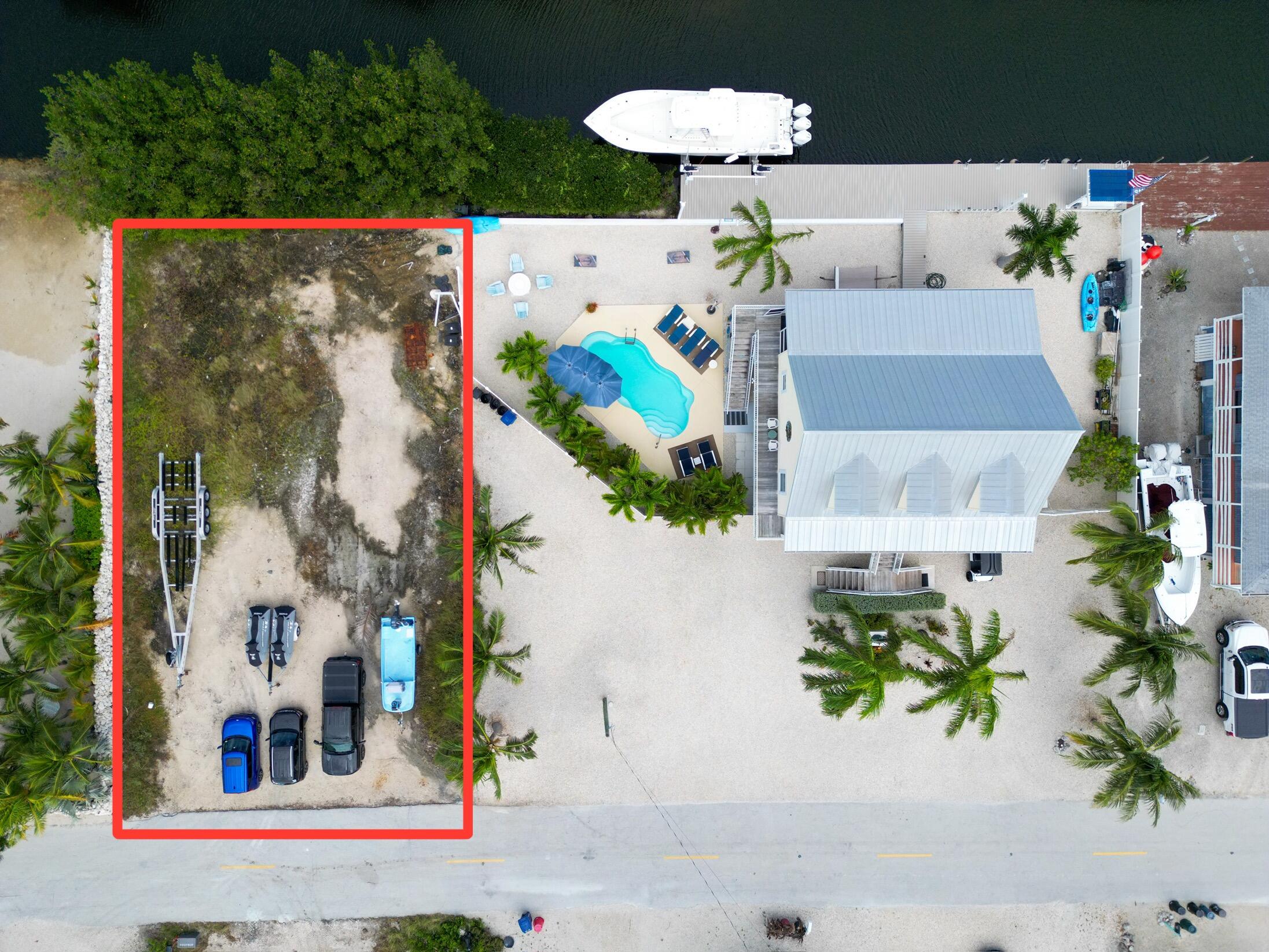 an aerial view of residential house with an outdoor space