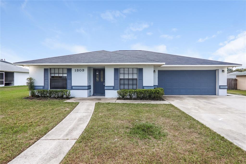 a front view of a house with yard