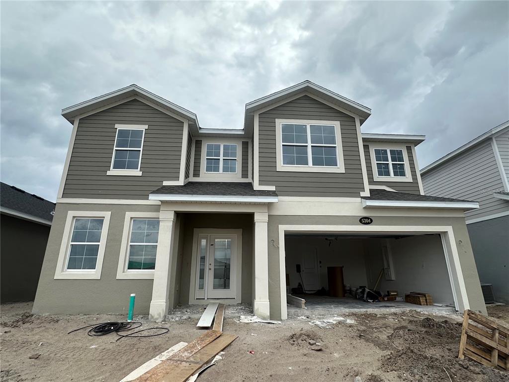 a view of a house with garage