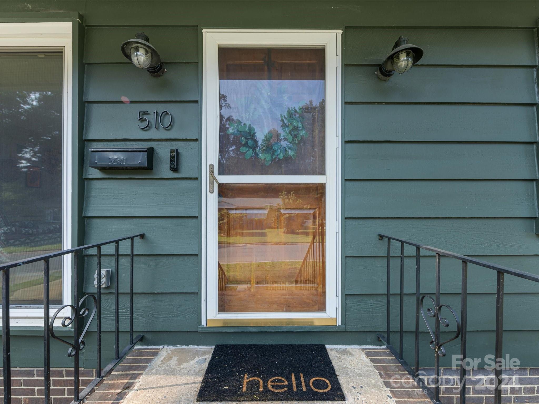 a view of a door and a window