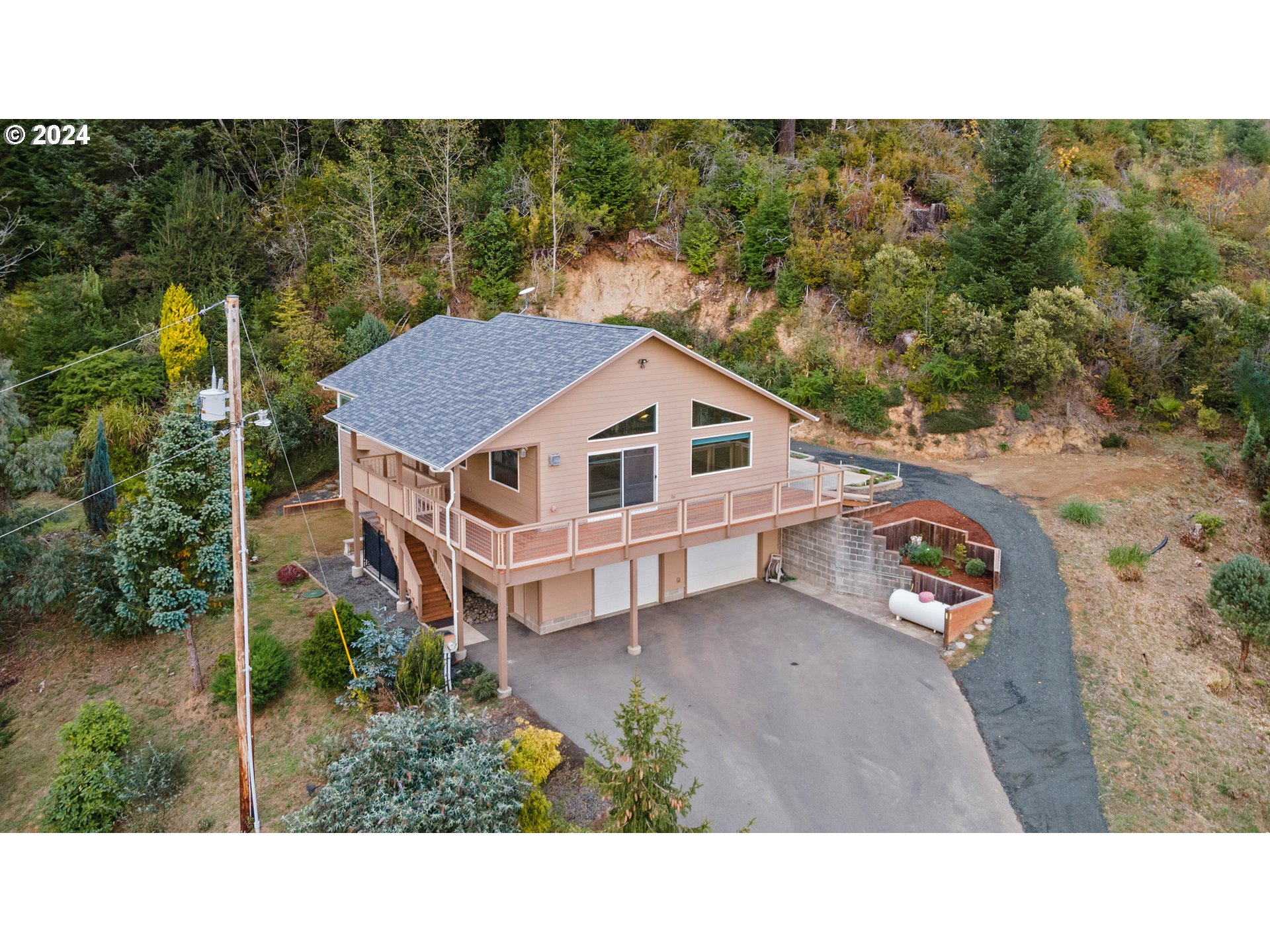 a upper view of a house with a yard