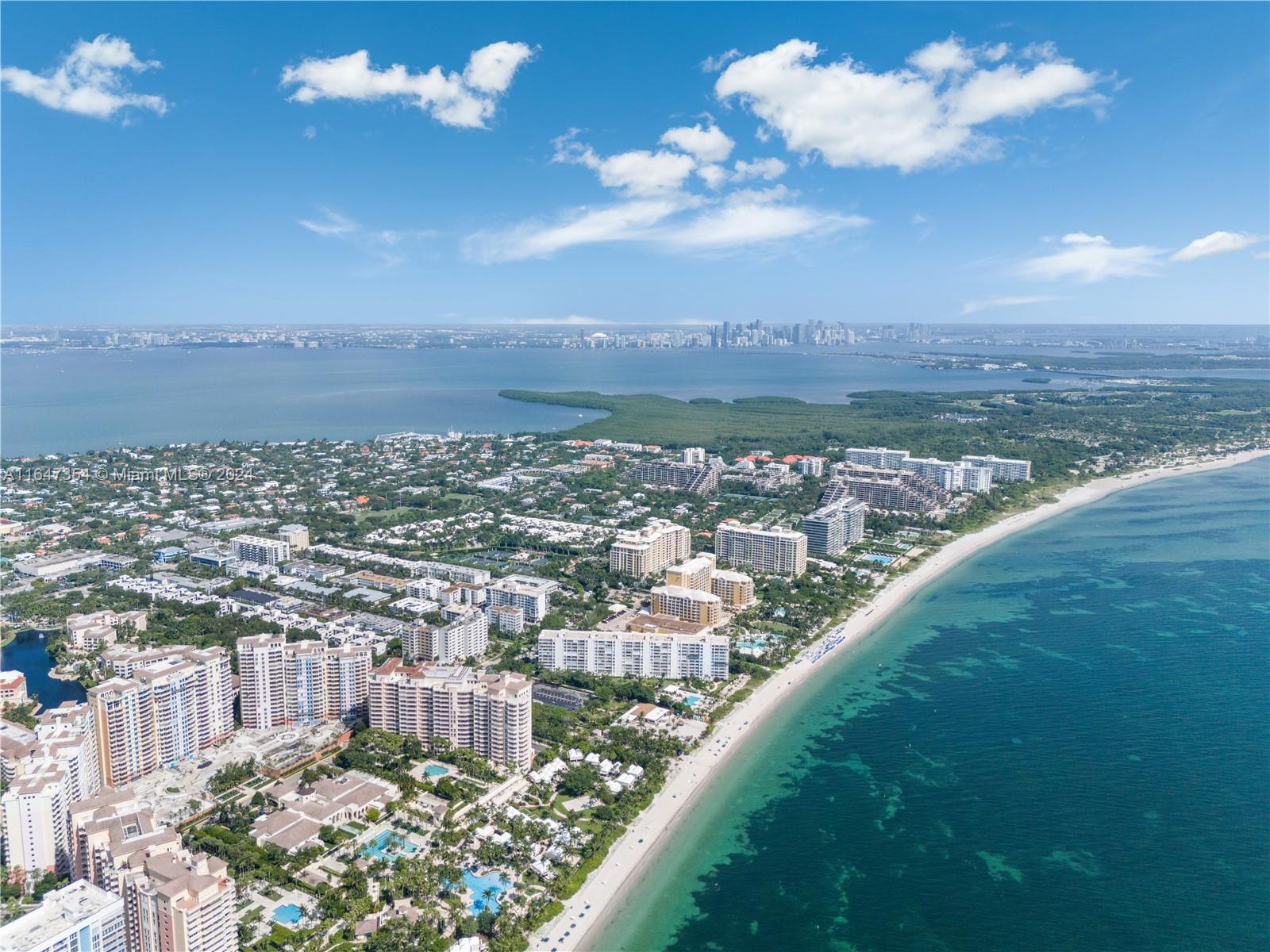 a view of a city with lots of green space