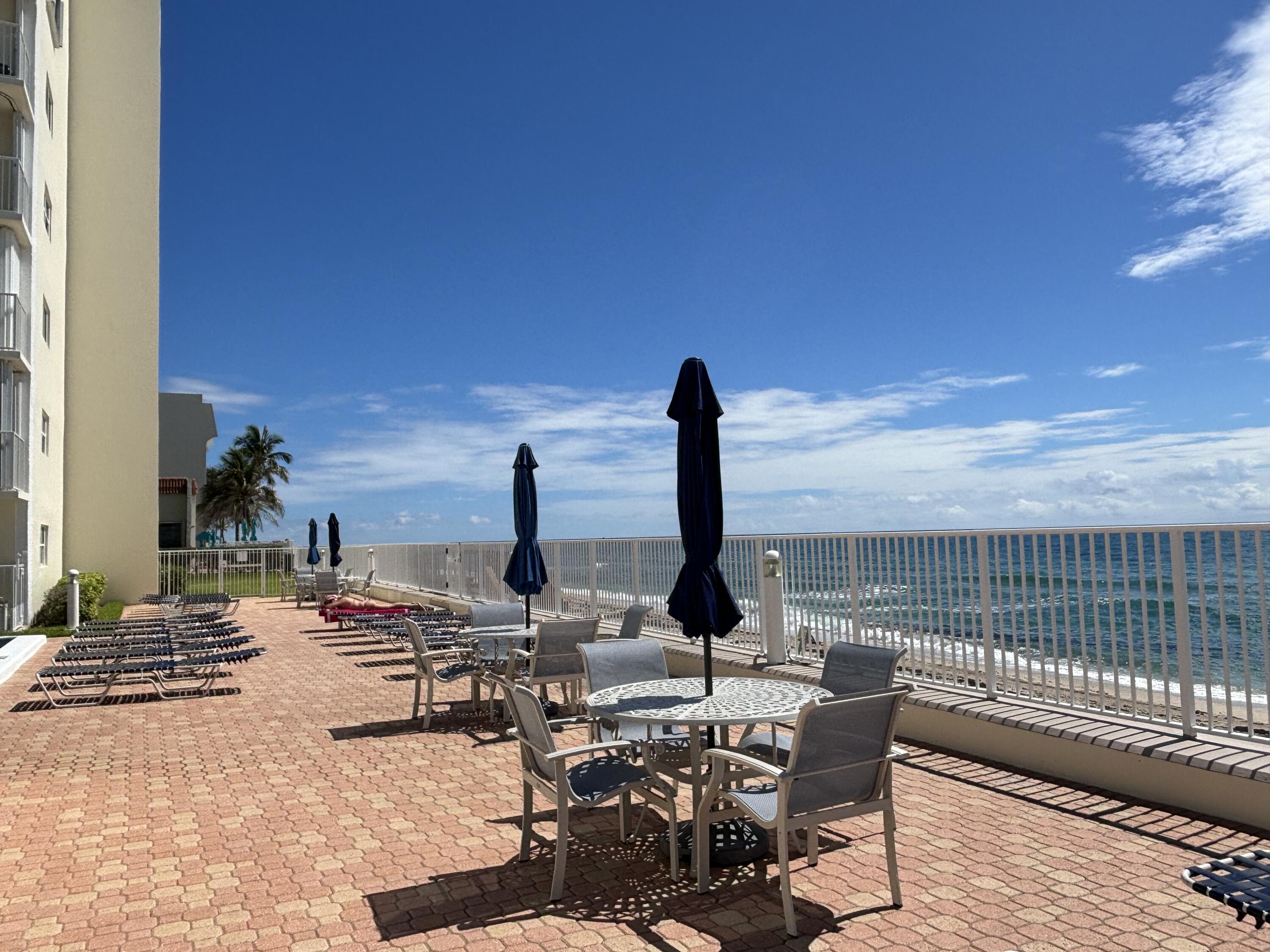 a view of a terrace with furniture