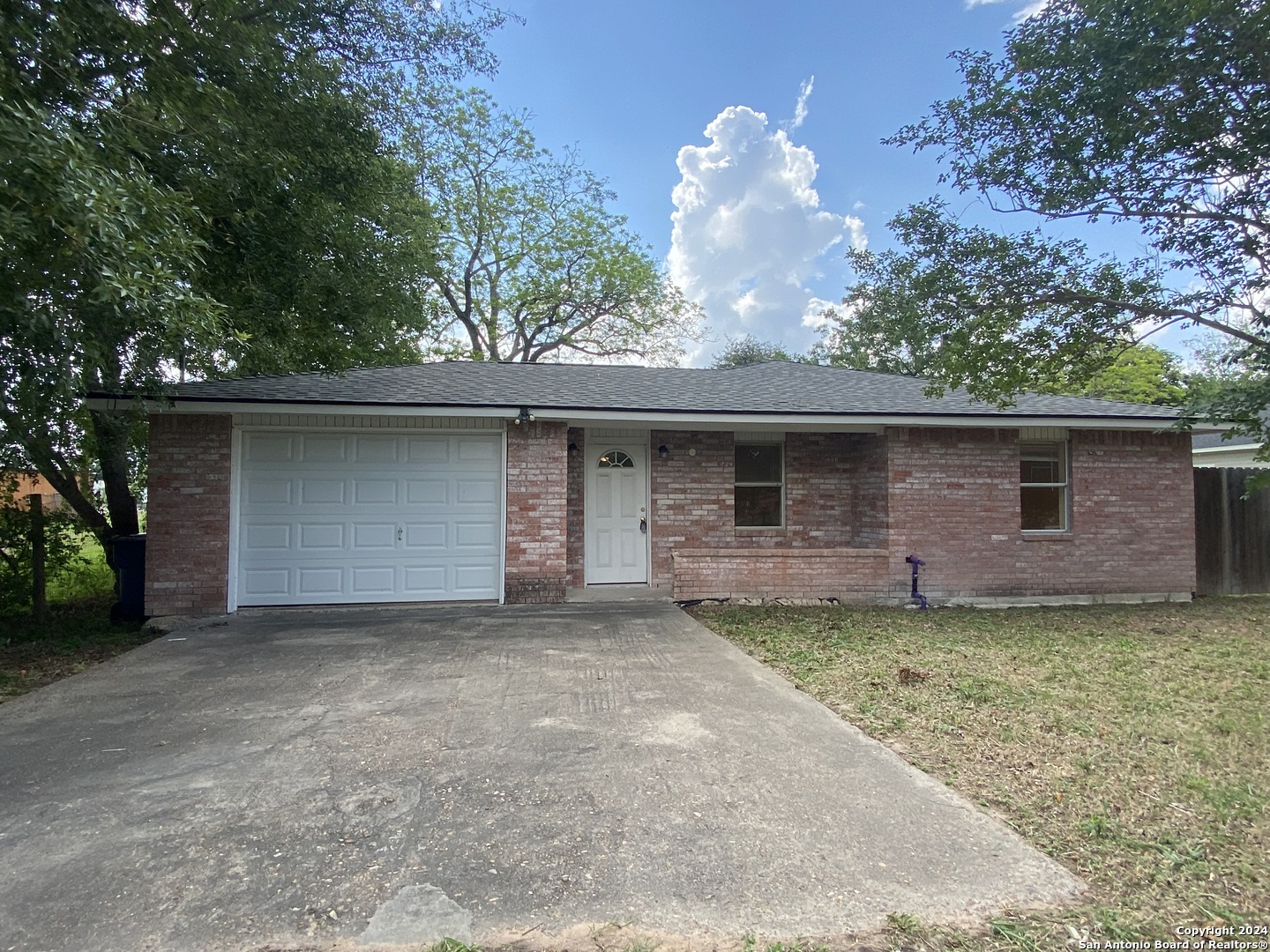 front view of a house with a garage