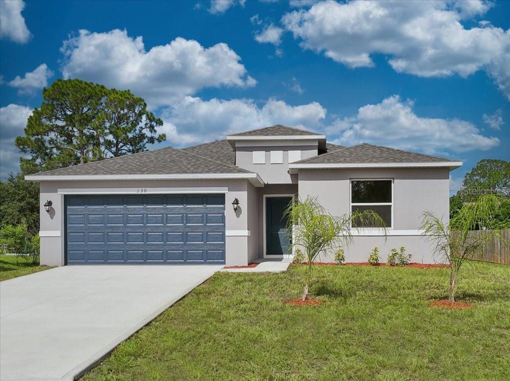 front view of house with a yard