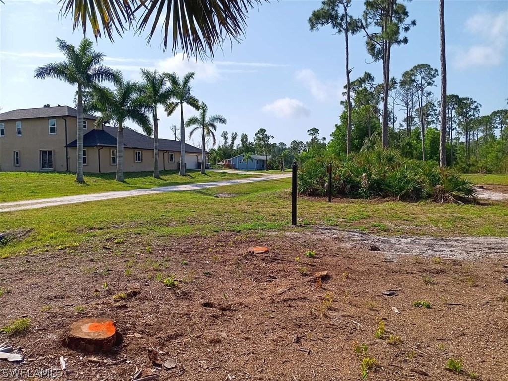 a view of a backyard with a garden