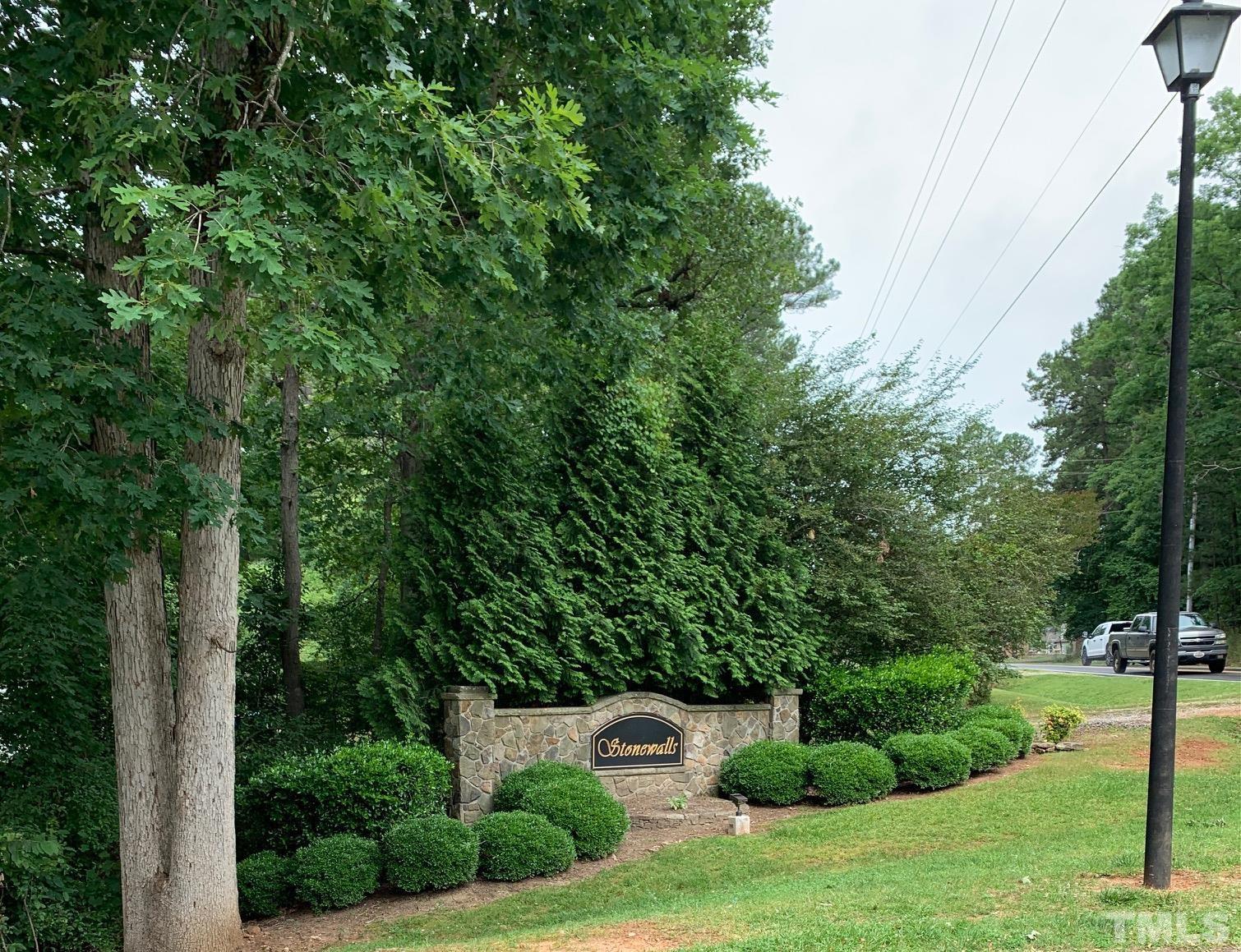 a view of backyard with green space