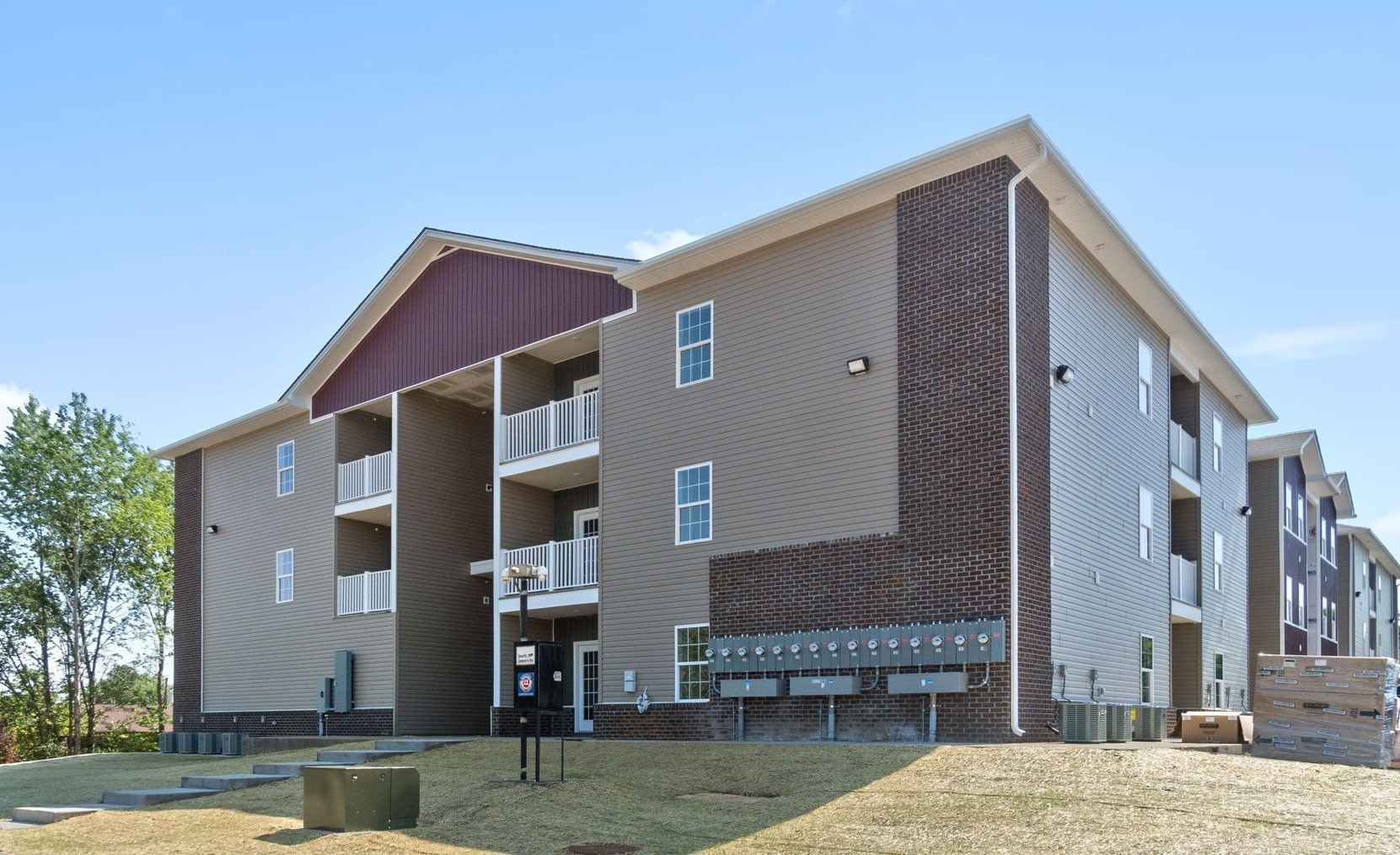 a front view of a building with street view