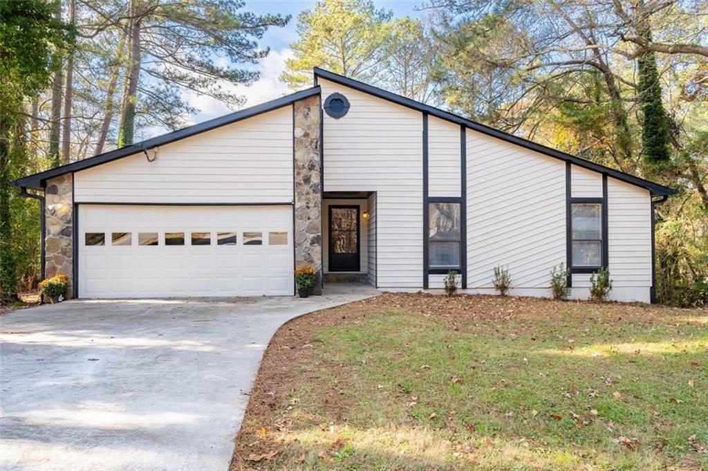 a view of front of house with garage