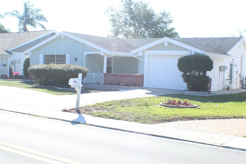 a front view of house with yard