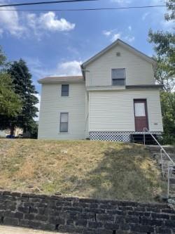 a front view of house with yard