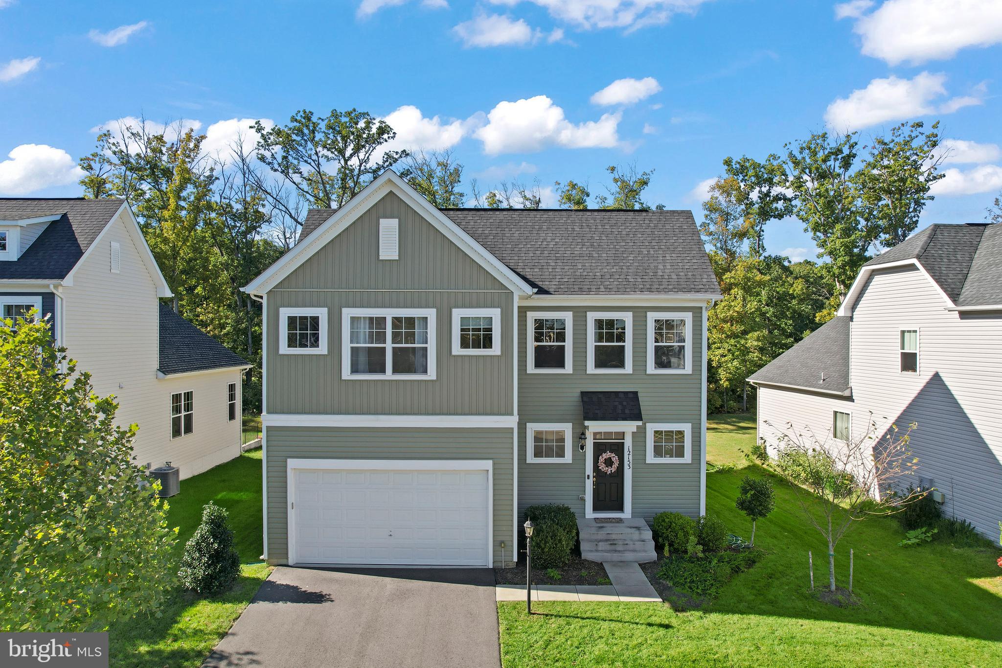 front view of house with a yard