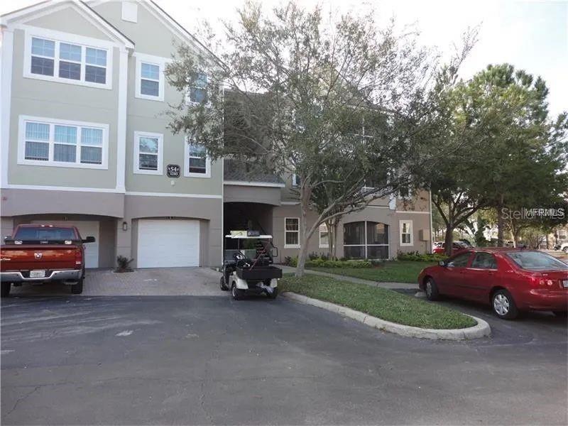 a view of a car in front of a house