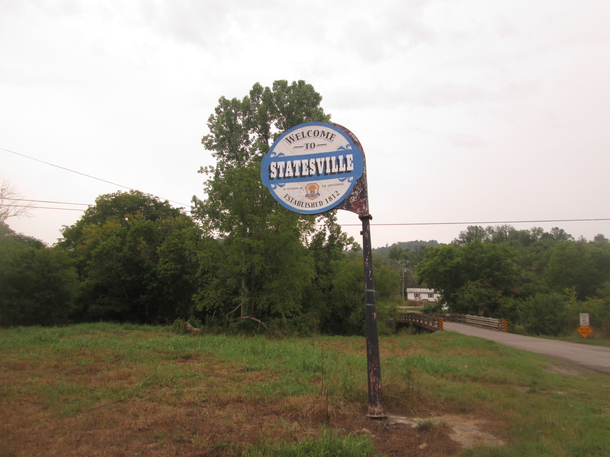 a view of a park with welcome board