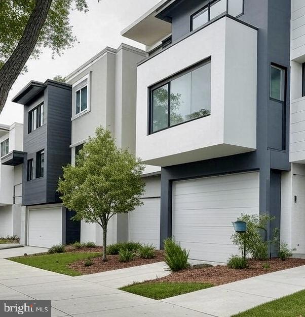 a house that has a tree in front of it