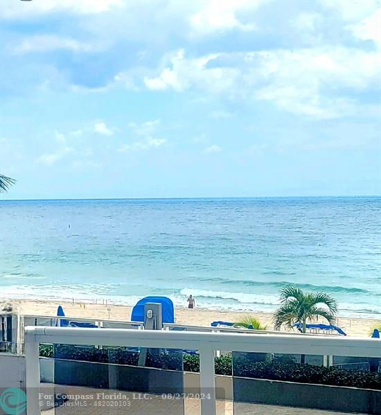 a view of a ocean from a balcony