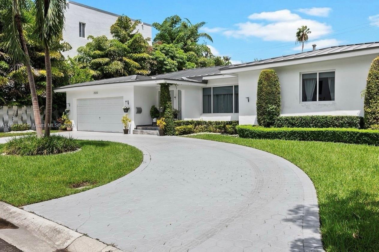 front view of a house with a patio