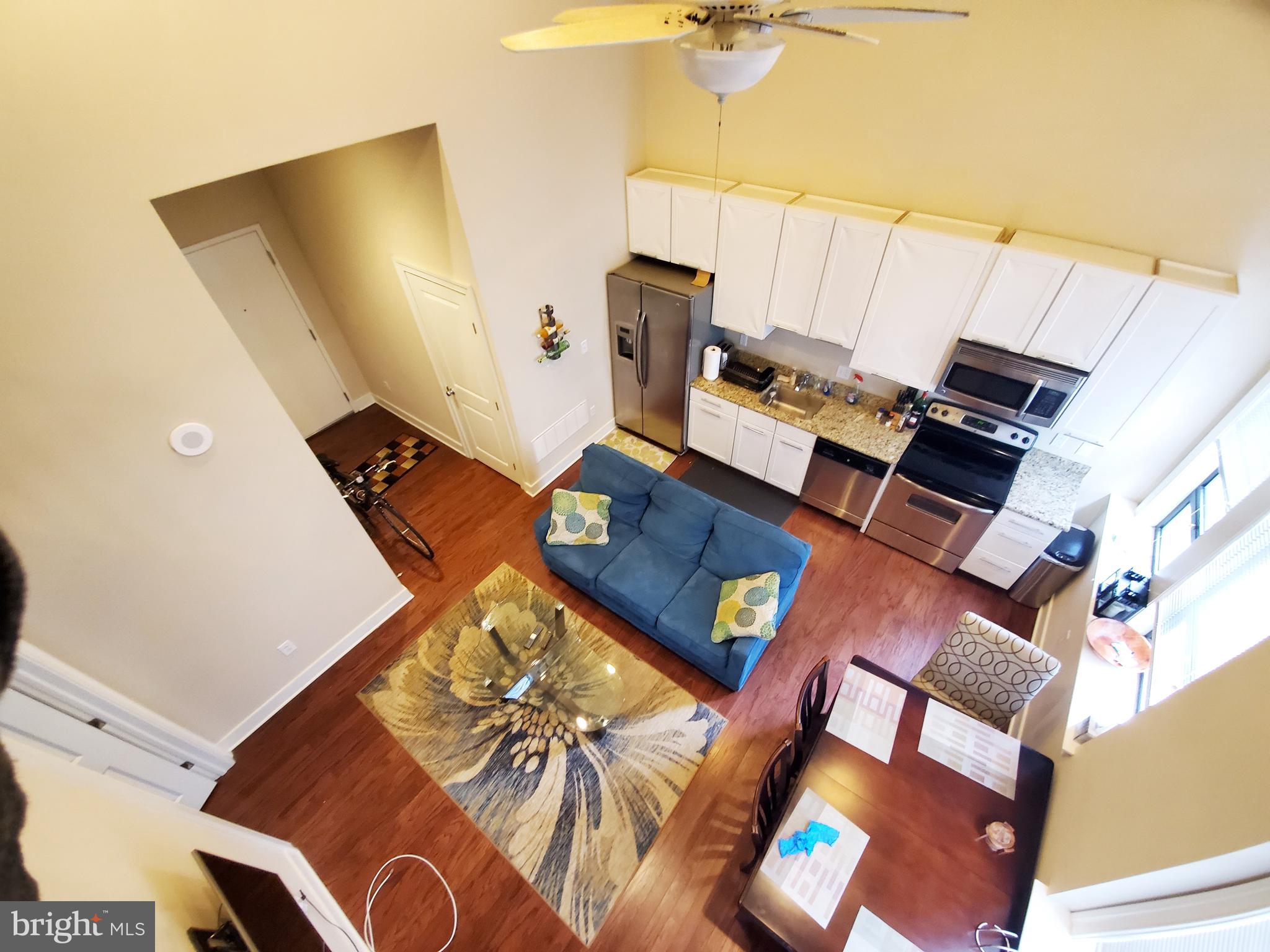 an aerial view of a fireplace with wooden floor