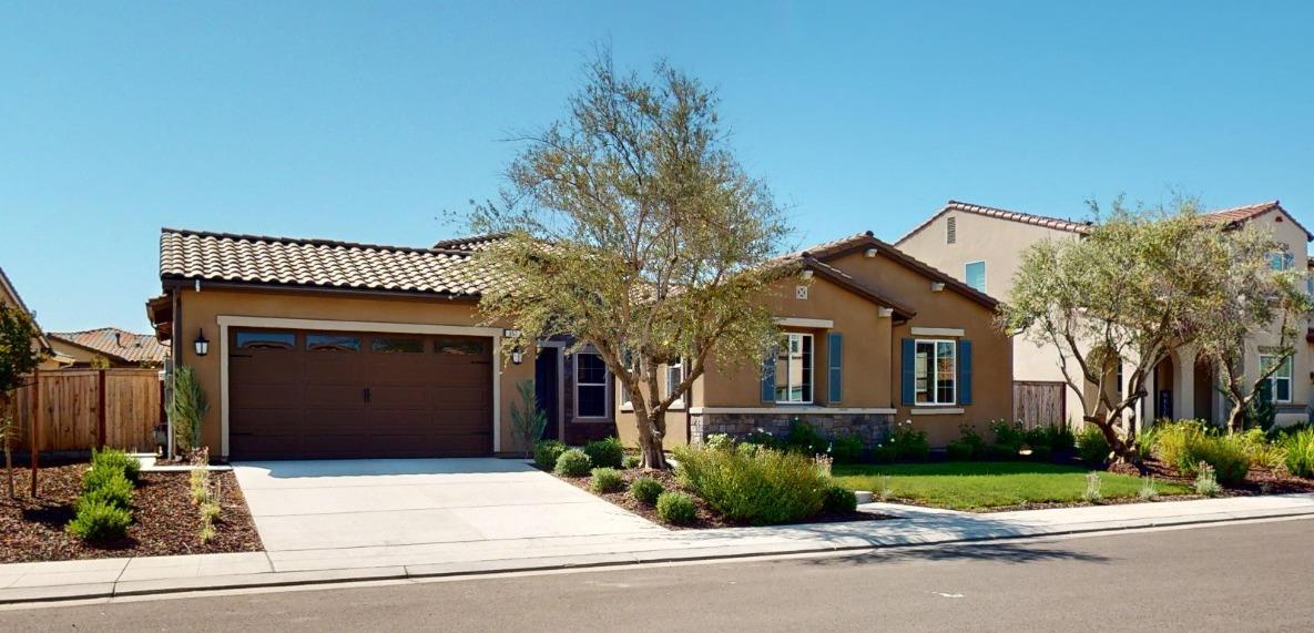 front view of a house and a yard