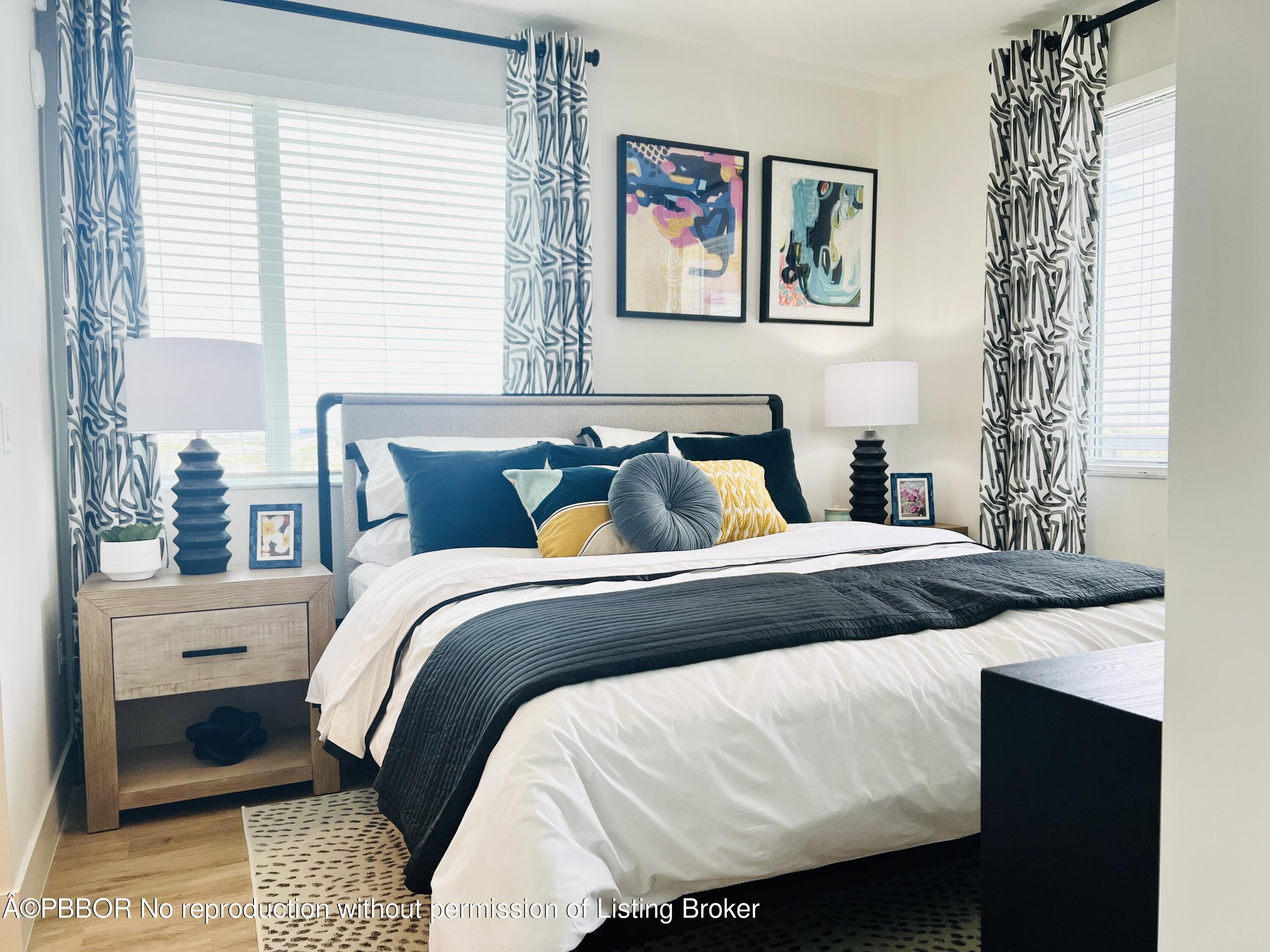 a bedroom with bed and window