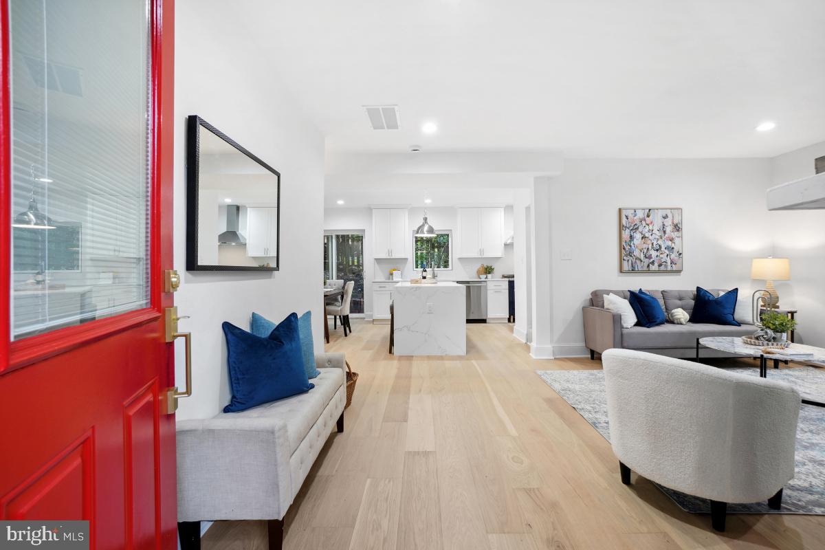 a living room with furniture and a couch