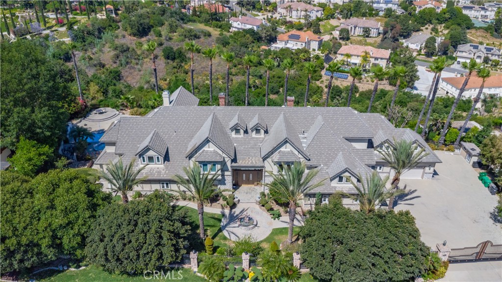 an aerial view of a house with a garden