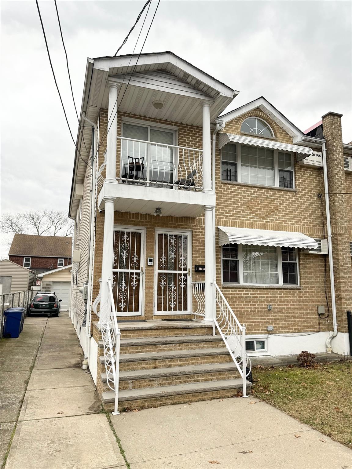 a front view of a house with a porch