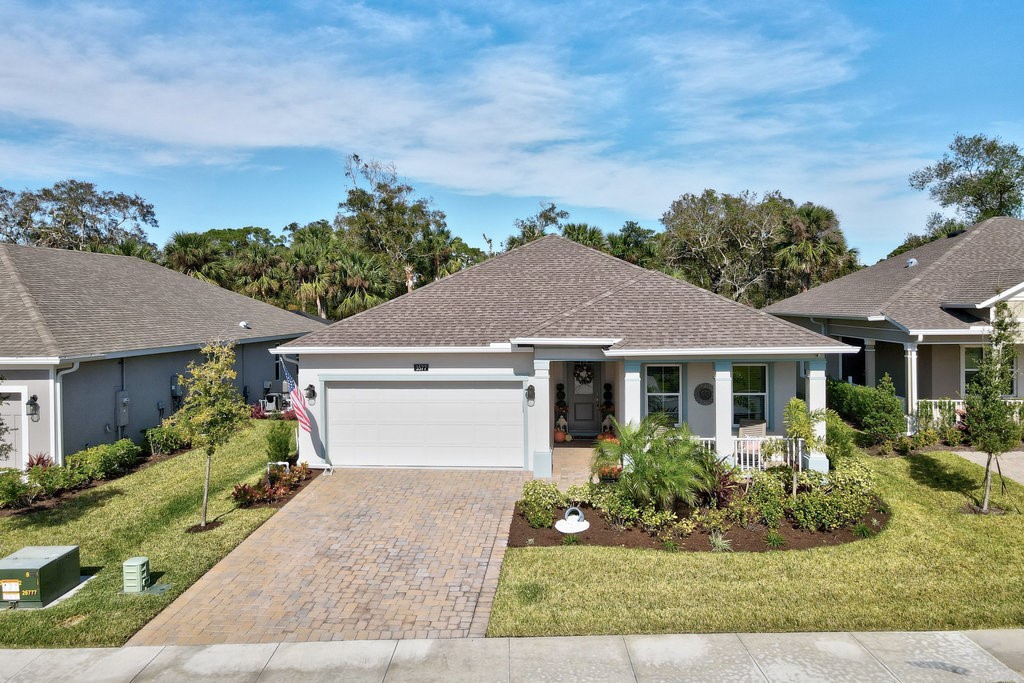 front view of a house with a yard