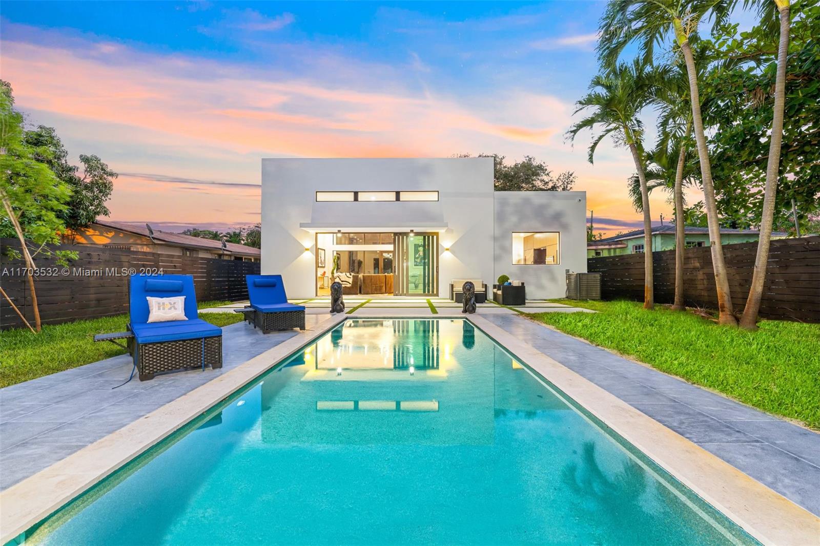 a view of a house with a swimming pool