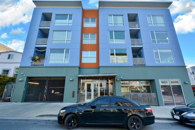 a car parked in front of a building