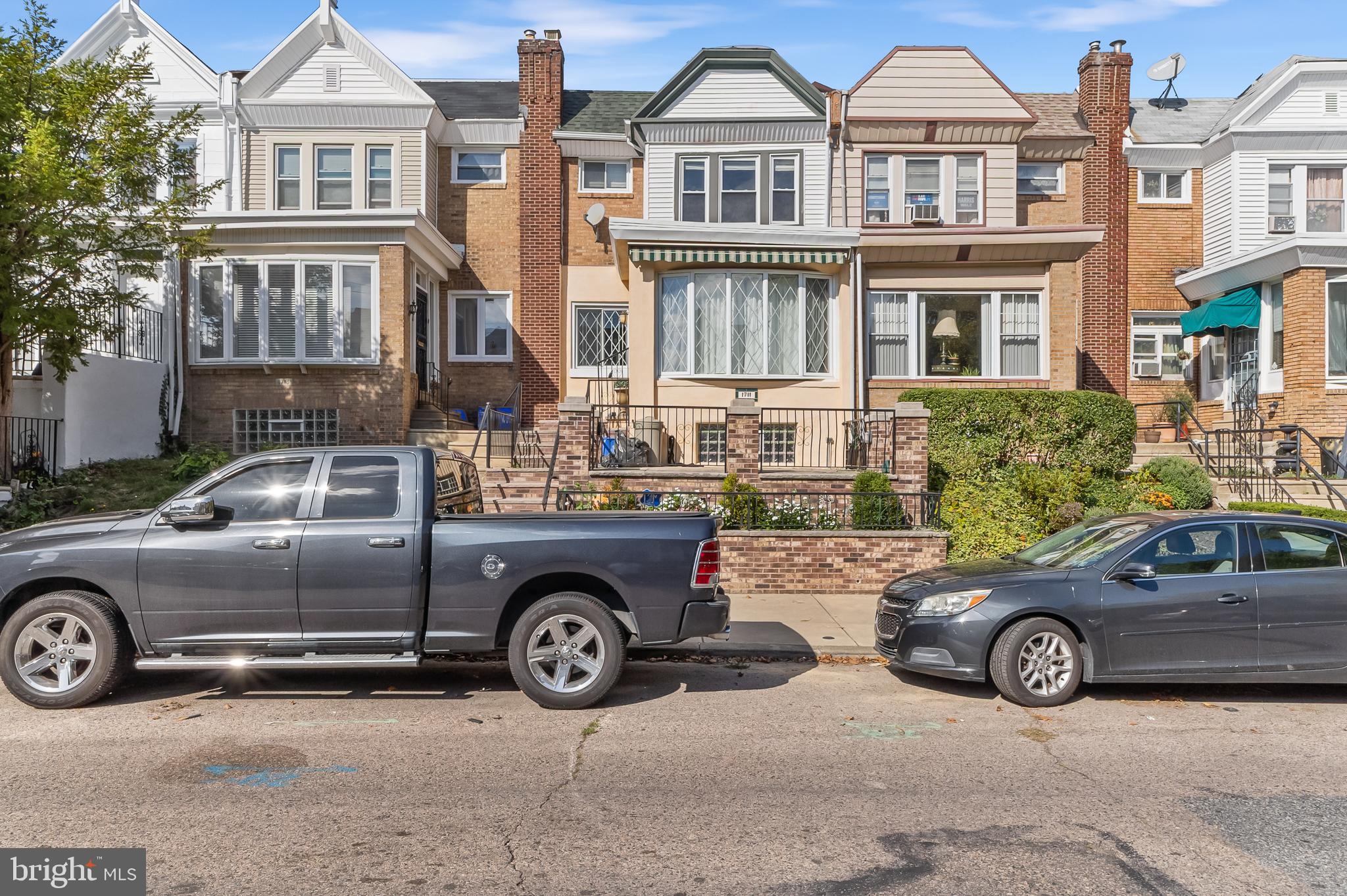 a car parked in front of a house