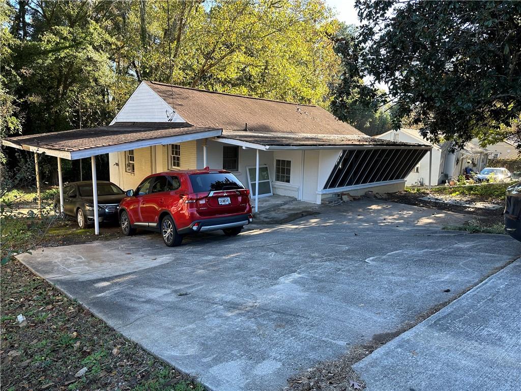 a car parked in front of a house