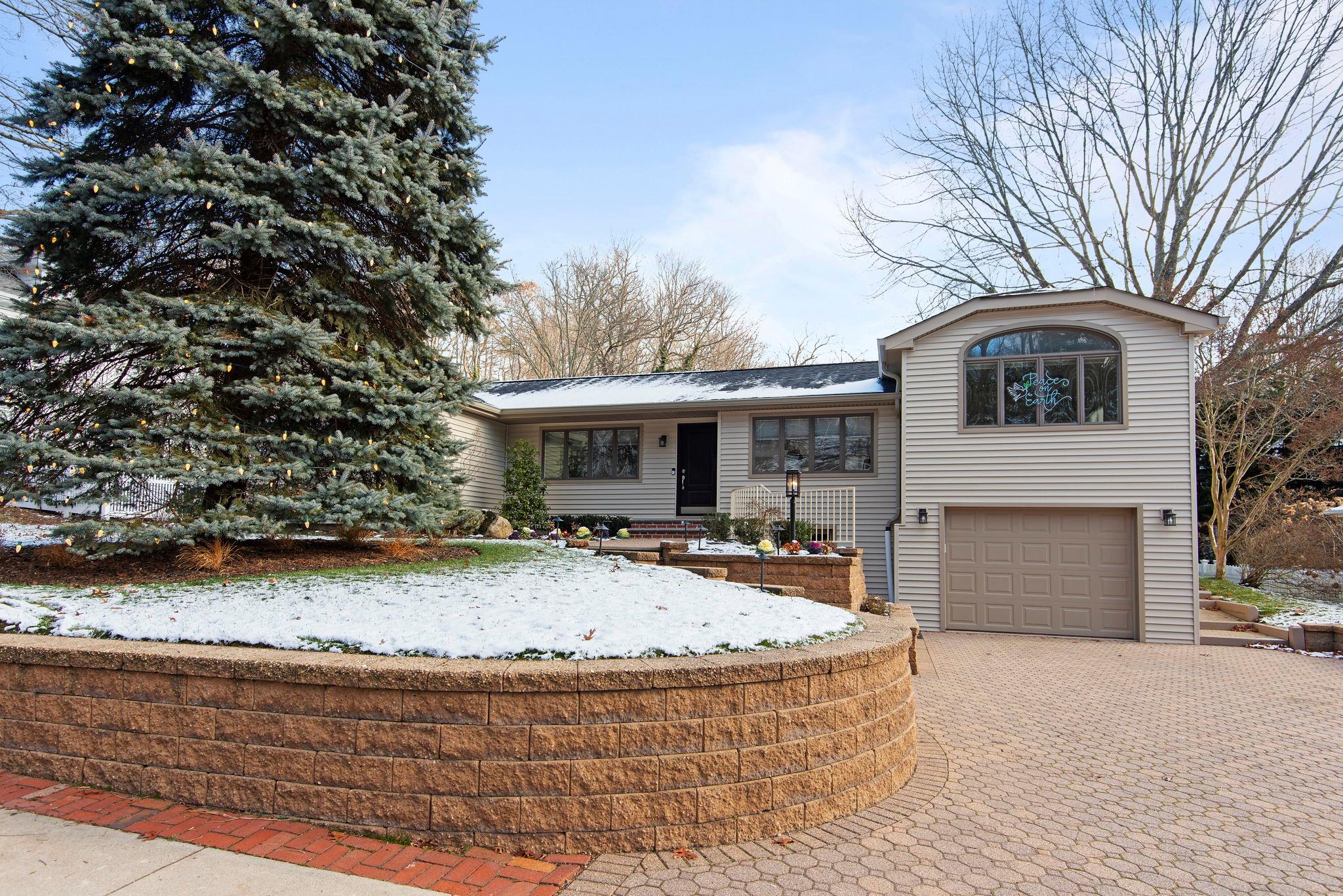 Ranch home featuring a garage