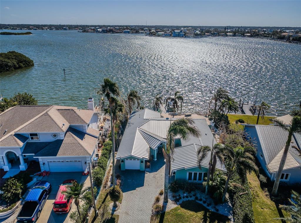 an aerial view of a house with outdoor space