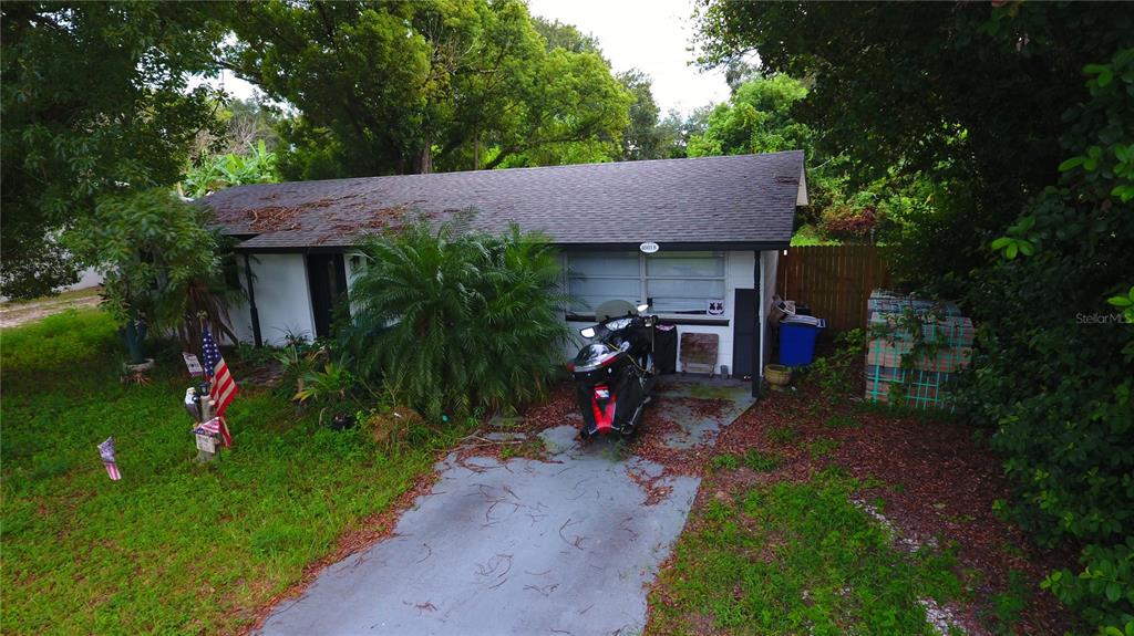 a view of a house that has a patio