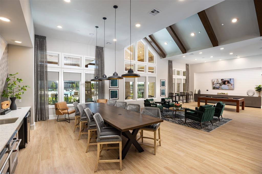 an open kitchen with a table and chairs