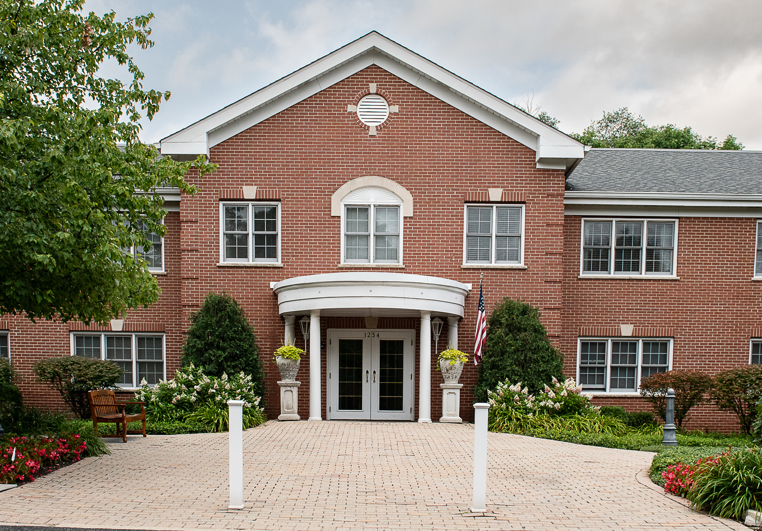 front view of a house with a yard