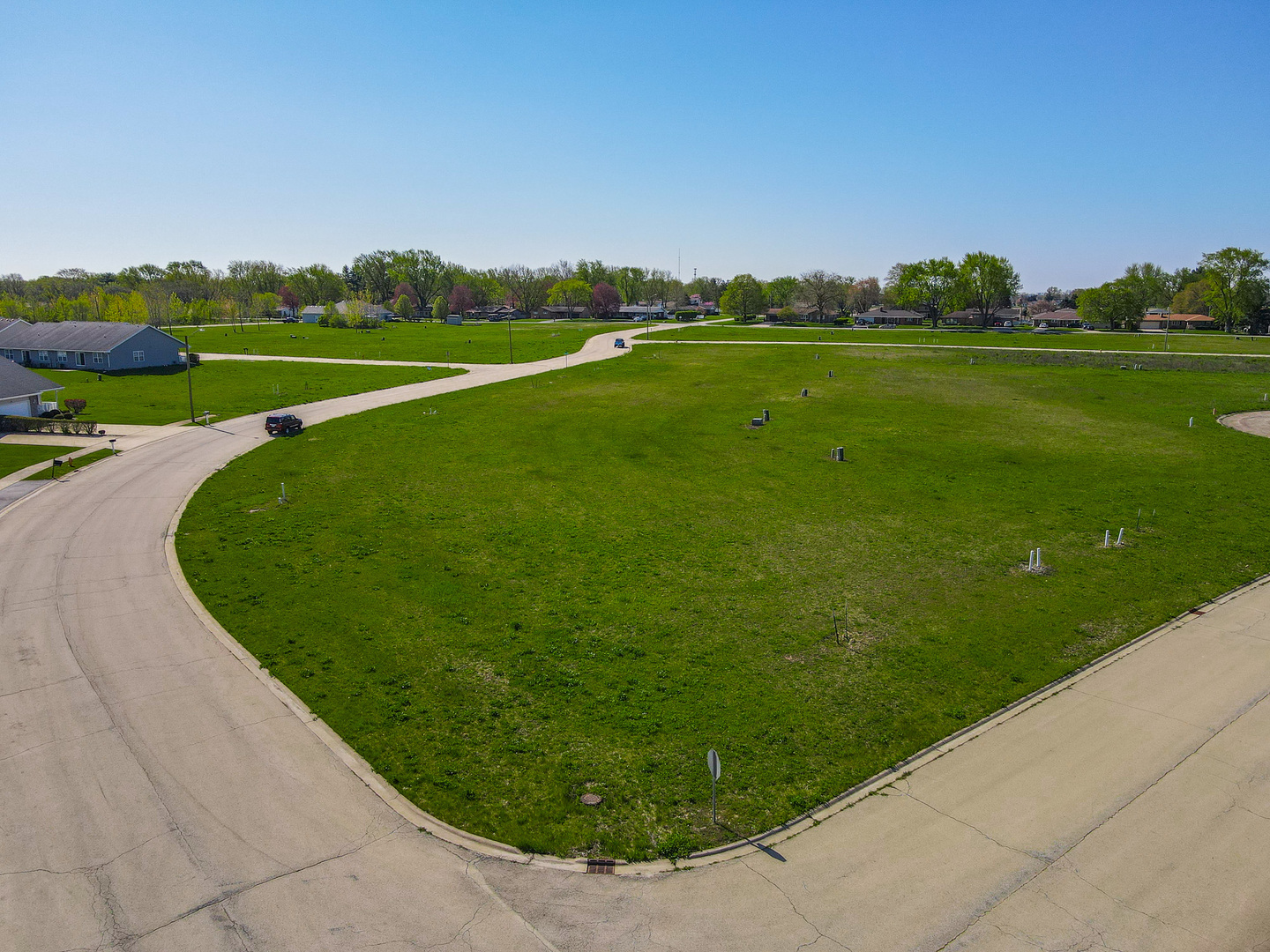 a view of a golf course with a lake