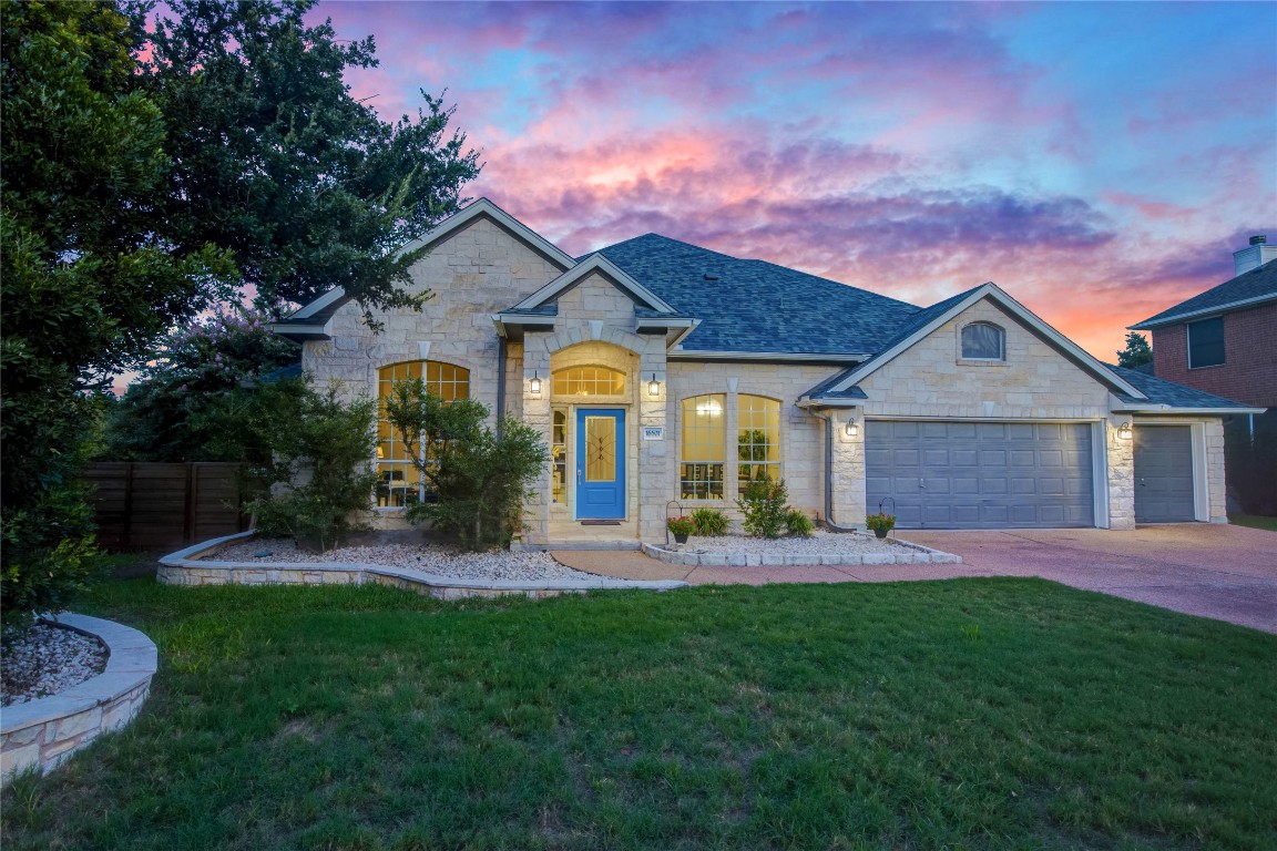 Front of the house features a beautiful natural sunset