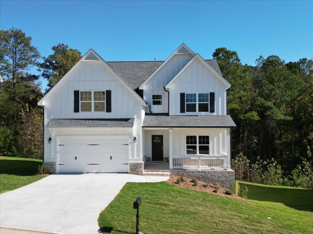 front view of a house with a yard