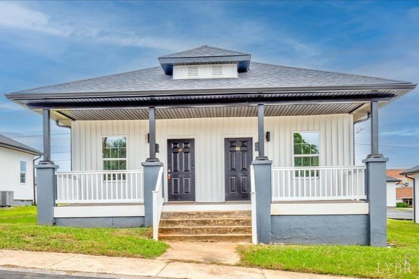 a front view of a house with a porch