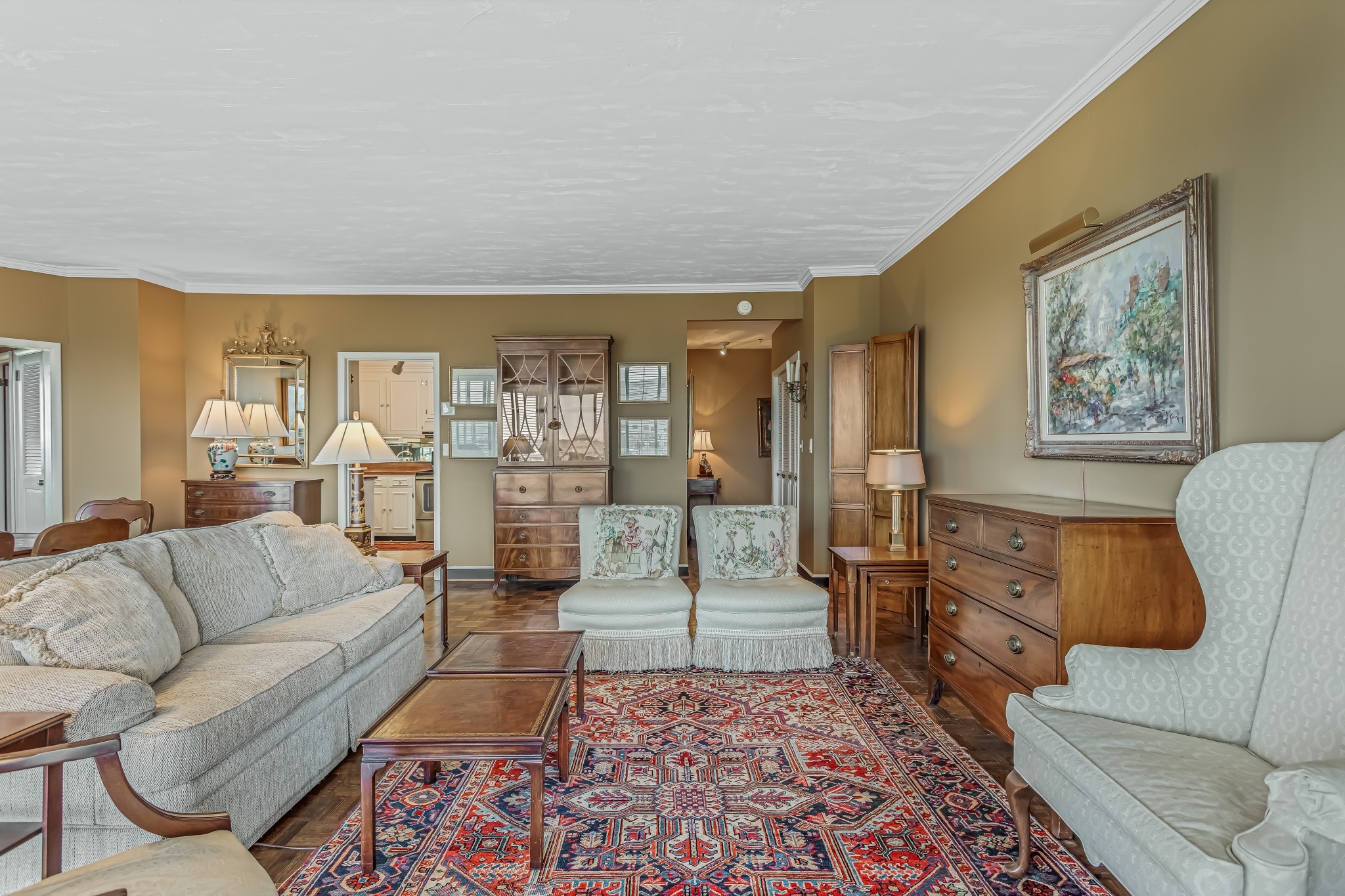 a living room with furniture and a rug