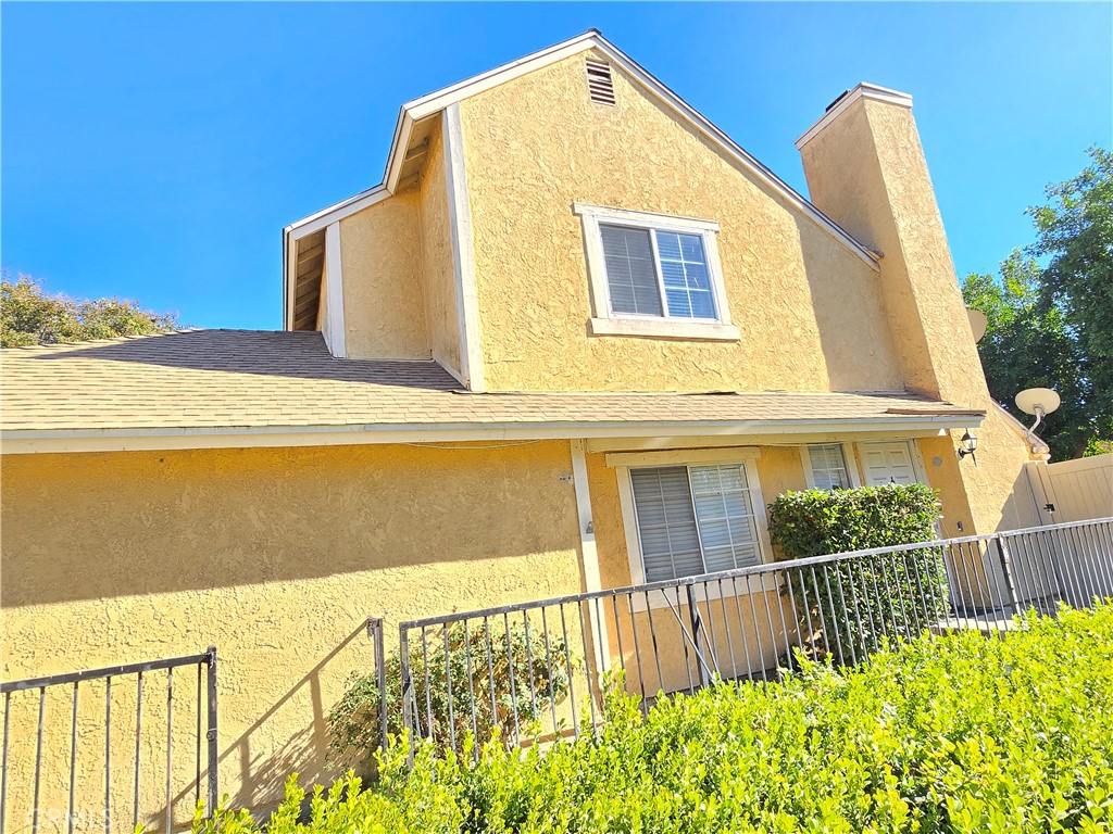 a view of a house with a balcony