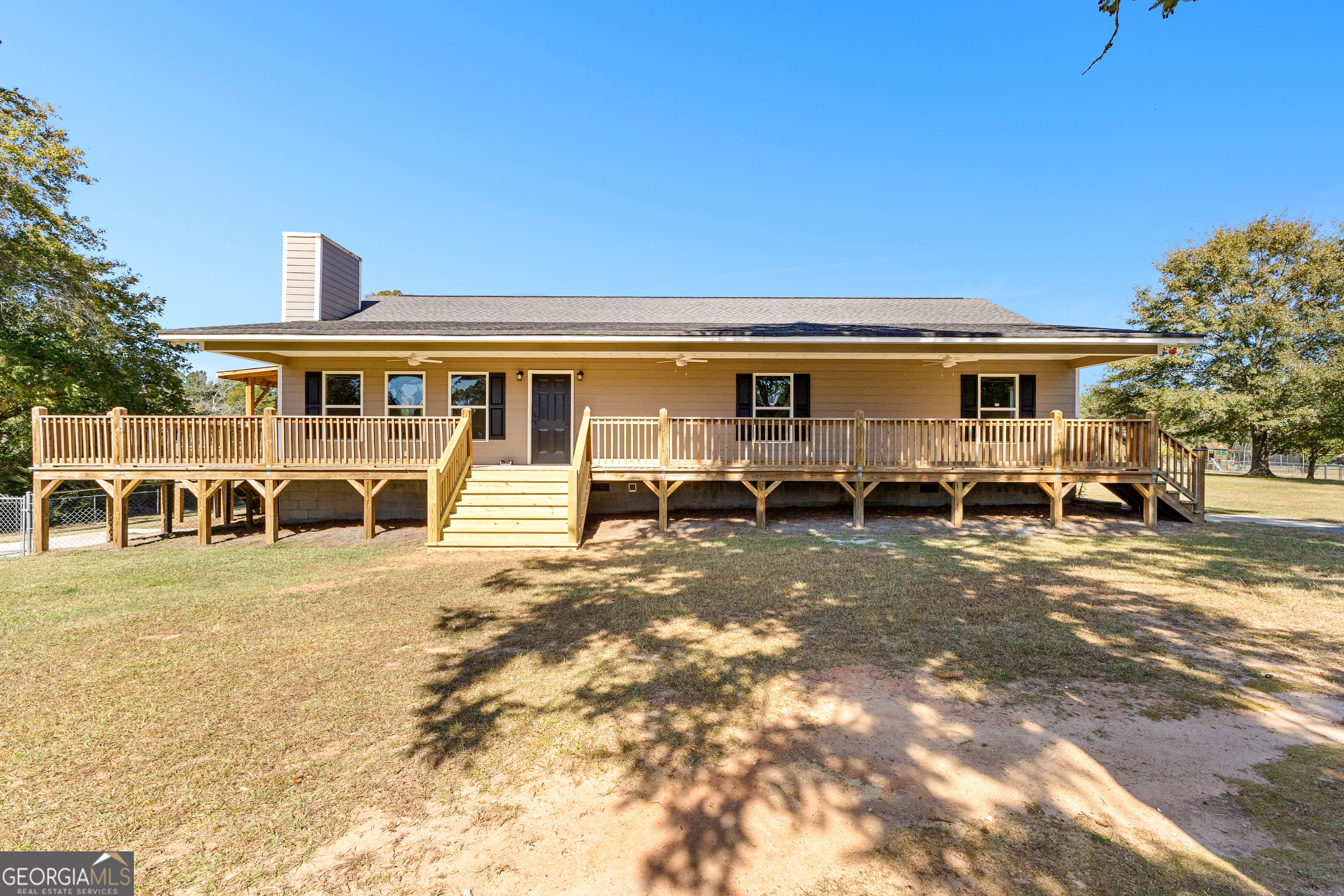 a view of a house with a patio