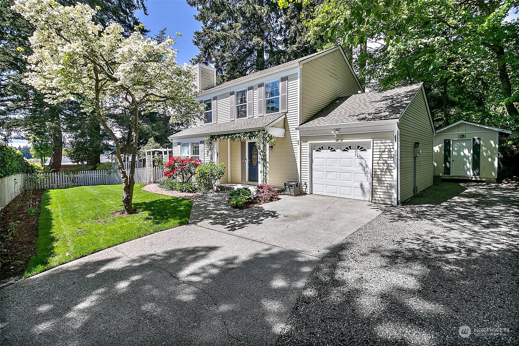 front view of a house with a yard